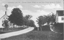 SA1595 - View of village road from Poland Spring to Portland and buildings. Identified on the front., Winterthur Shaker Photograph and Post Card Collection 1851 to 1921c